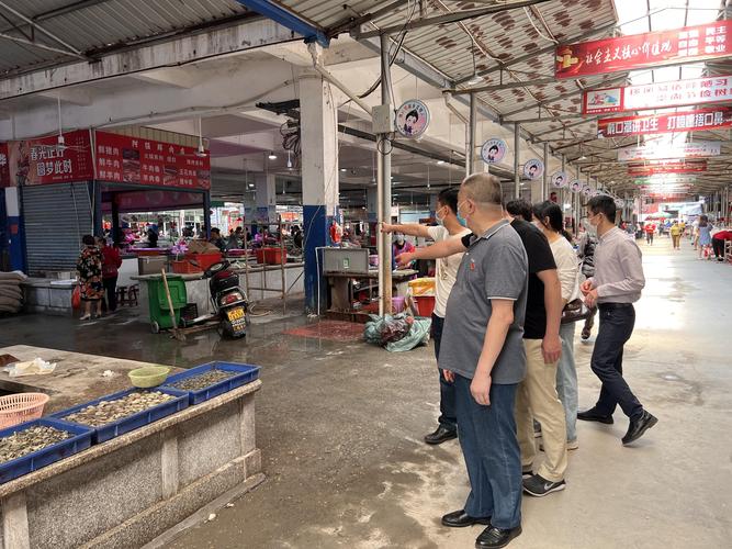 农贸市场开展督查工作机关第一党支部党员志愿者开展烟头不落地莆田